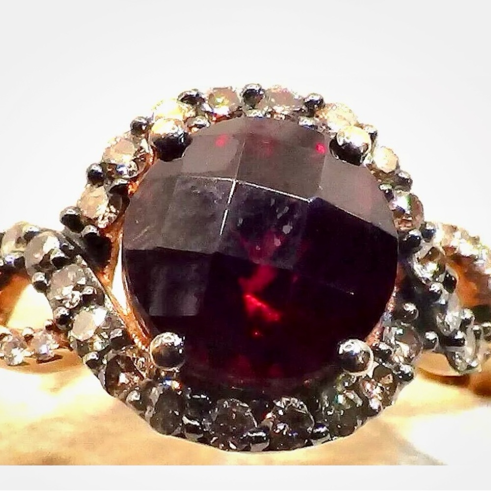 Elegant Garnet and Diamond Ring